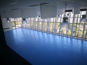 View of an empty swimming pool against building