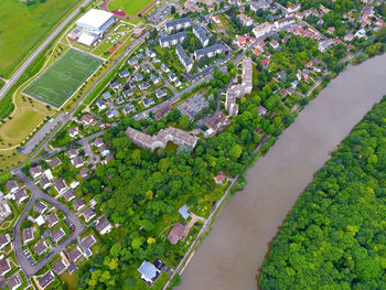 High angle view of plants by building in city