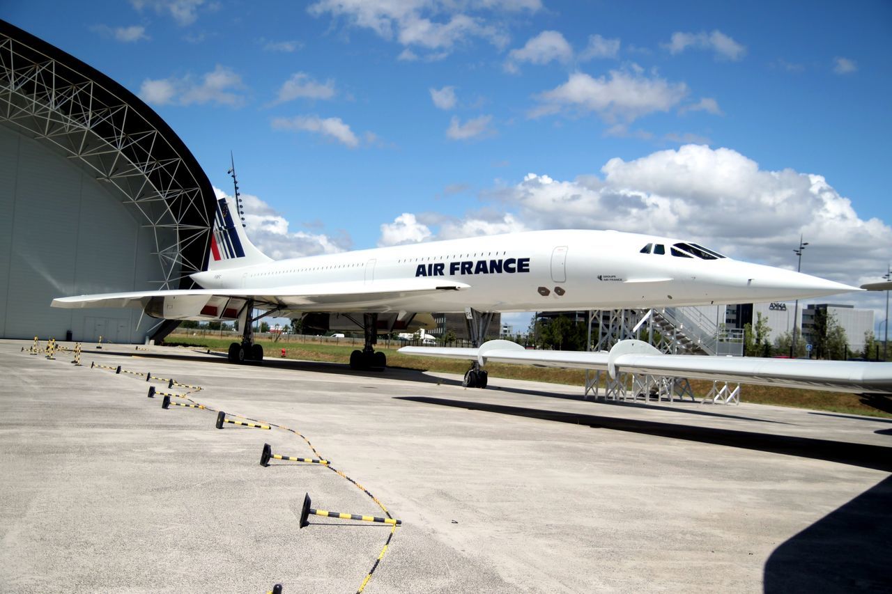 airplane, air vehicle, day, transportation, sky, cloud - sky, built structure, airport, outdoors, architecture, aerospace industry, no people