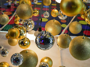 Close-up of balloons hanging on table