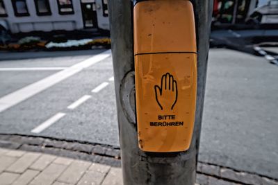 Road sign on street in city