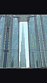 Low angle view of modern buildings against sky