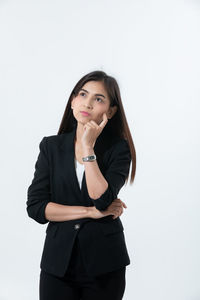 Portrait of a beautiful young woman over white background