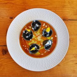 High angle view of fruits in plate on table