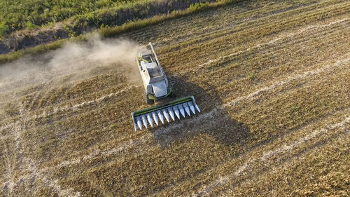 Tractor working on agricultural field