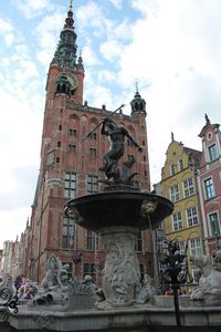 Low angle view of church against cloudy sky