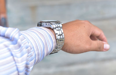 Close-up of hand against blurred background