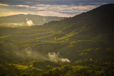 Scenic view of mountains against sky during sunset