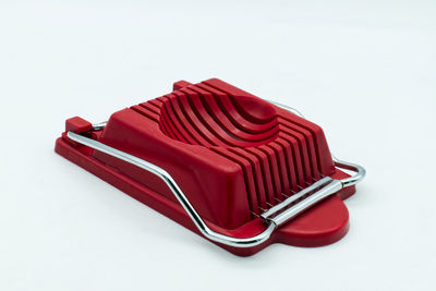 High angle view of empty seats on table against white background