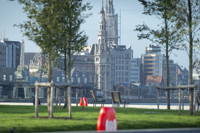 Buildings in city against sky