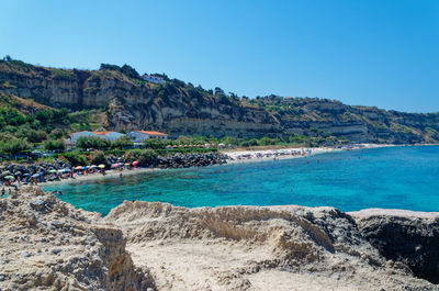 Scenic view of sea against clear blue sky