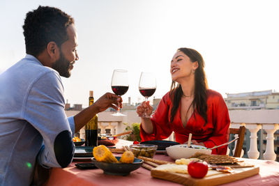 Young woman having food at restaurant