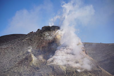 Panoramic view of volcanic landscape against sky