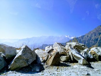 Scenic view of mountains against clear blue sky