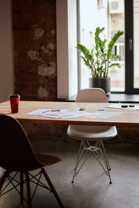 Empty chairs and table at home