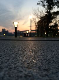 Street light on road against sky