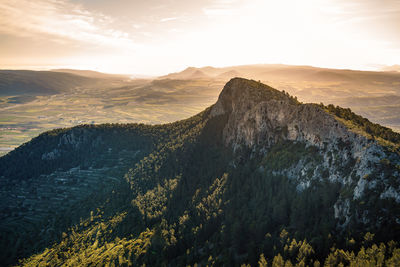 Scenic view of landscape against sky during sunset