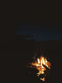 Bonfire against sky at night