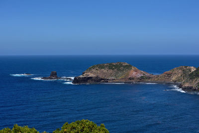 Scenic view of sea against clear sky