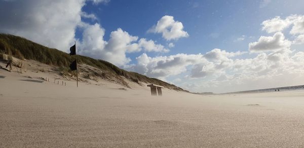 Panoramic view of desert against sky