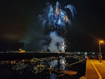 Firework display at night