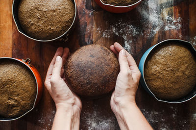 High angle view of person preparing food on table