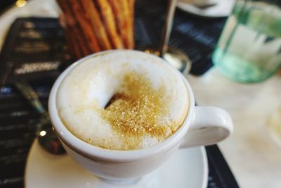 Close-up of coffee cup on table