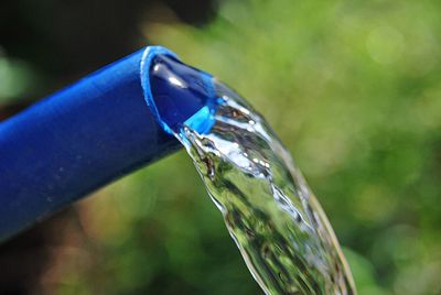 Close-up of water drop on glass