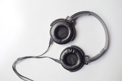 High angle view of electric lamp against white background