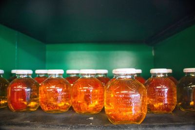 Close-up of bottles of apple juice 