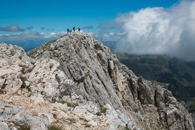 Panoramic view of rocks and mountains against sky