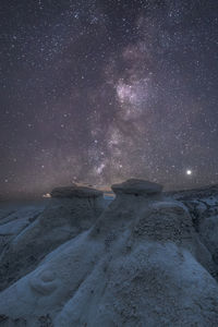 Scenic view of sea against sky at night