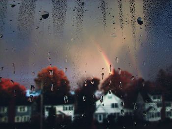 Raindrops on glass window in rainy season