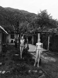 Rear view of woman walking outside building