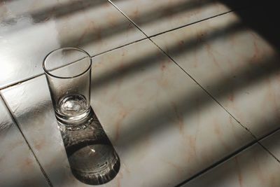 High angle view of glass on table