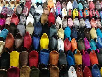 Full frame shot of multi colored shoes in market for sale