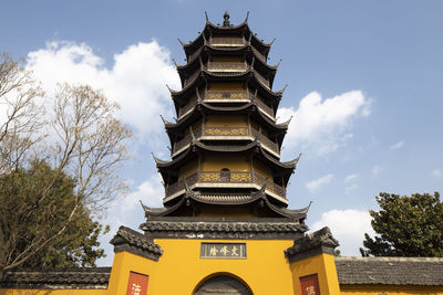 Low angle view of pagoda against sky