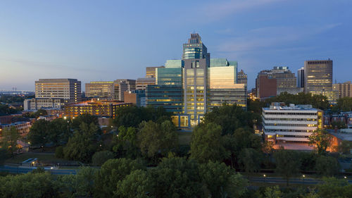 Buildings in city against sky