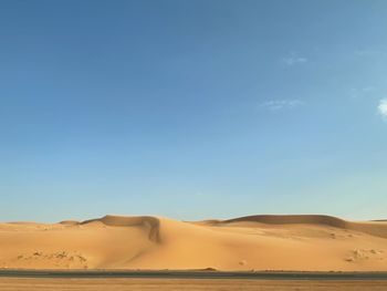 Scenic view of desert against sky