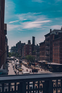 Buildings in city against sky