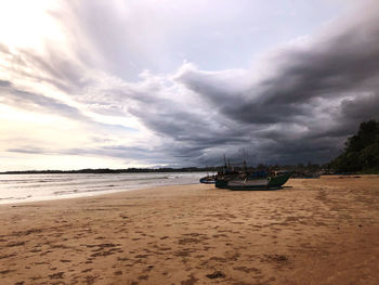 Scenic view of beach against sky