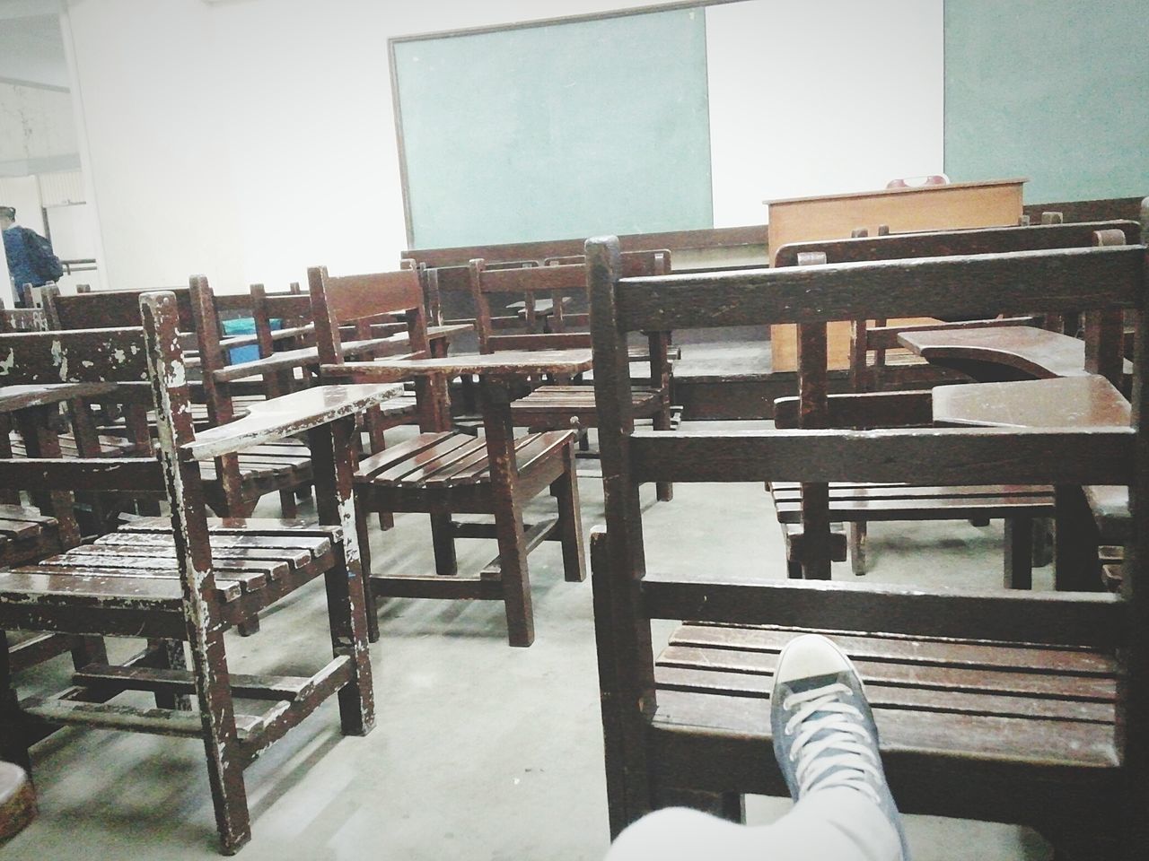 chair, built structure, empty, architecture, absence, indoors, table, building exterior, seat, wood - material, furniture, window, day, sunlight, shoe, bench, house, relaxation, one person, low section