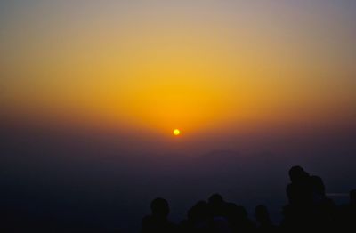 Silhouette trees at sunset