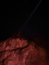 Full frame shot of red light against sky at night