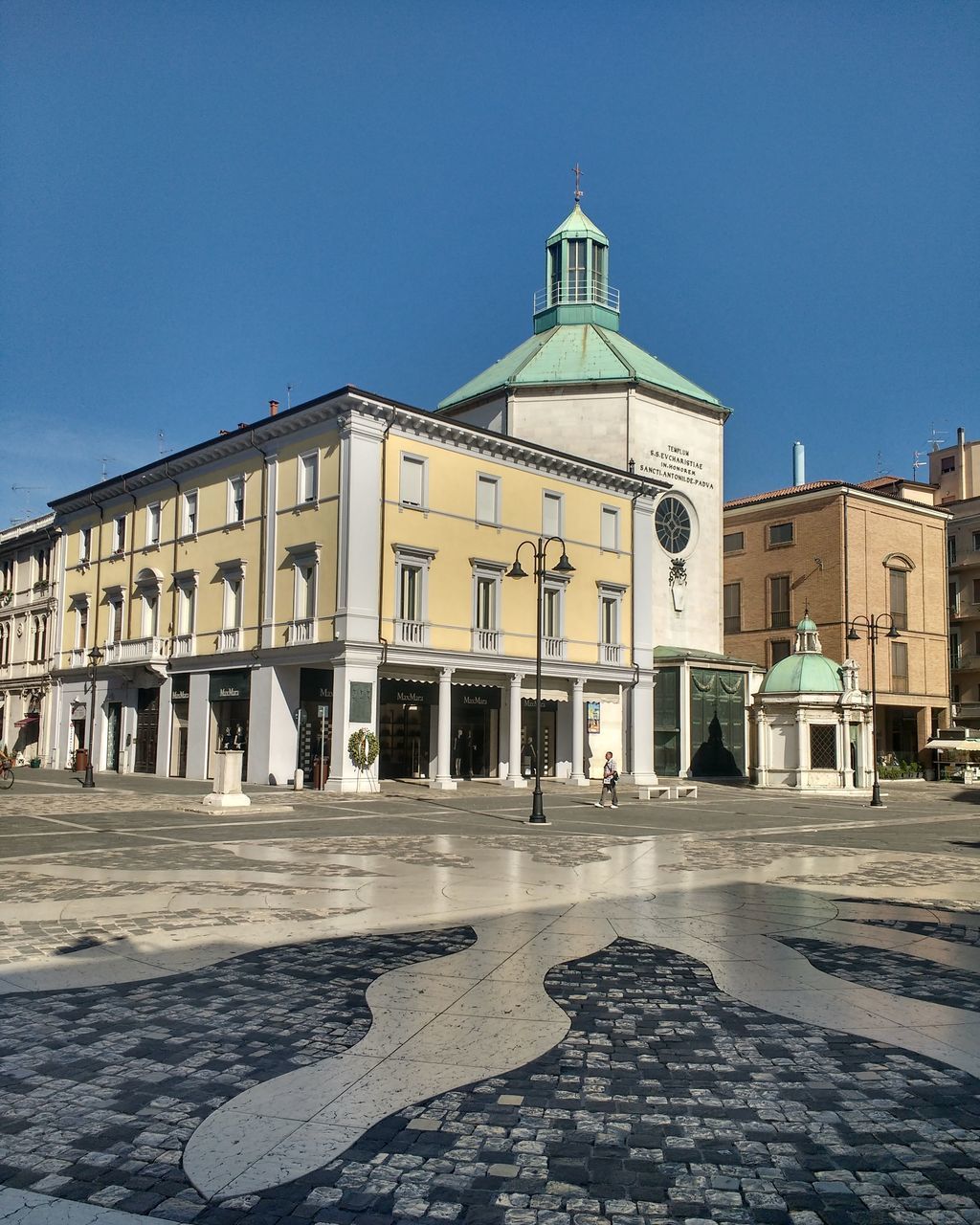 VIEW OF BUILDING AGAINST BLUE SKY