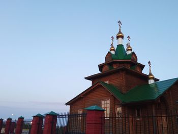 Low angle view of lighthouse against clear sky