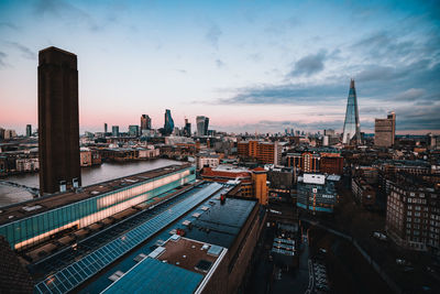 High angle view of buildings in city against sky