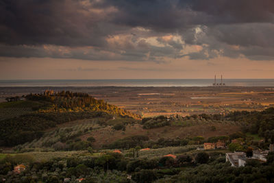 Scenic view of sea against sky at sunset