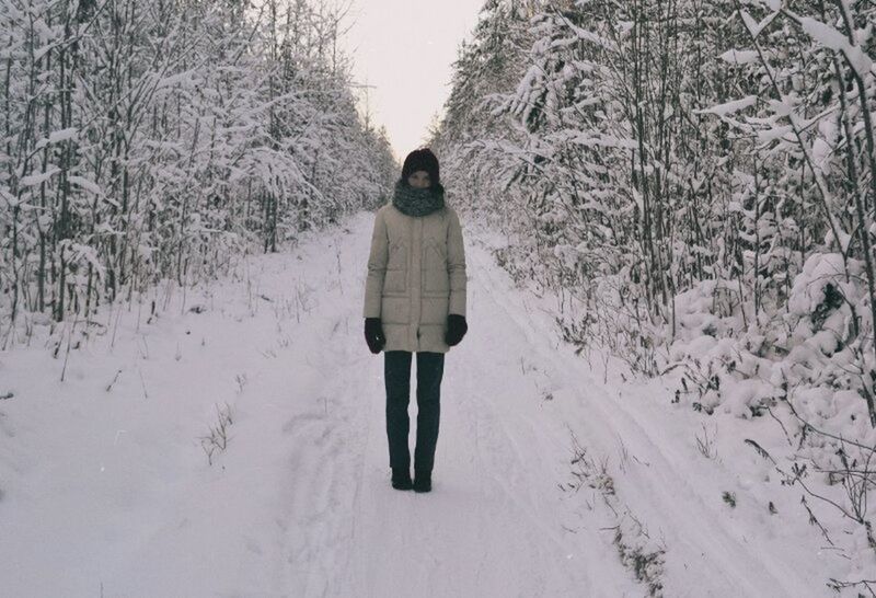 winter, snow, cold temperature, one person, warm clothing, tree, nature, walking, real people, full length, outdoors, rear view, bare tree, field, standing, beauty in nature, day, snowing, people, adult