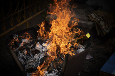 A fire burn paper, chinese traditions, iron stove